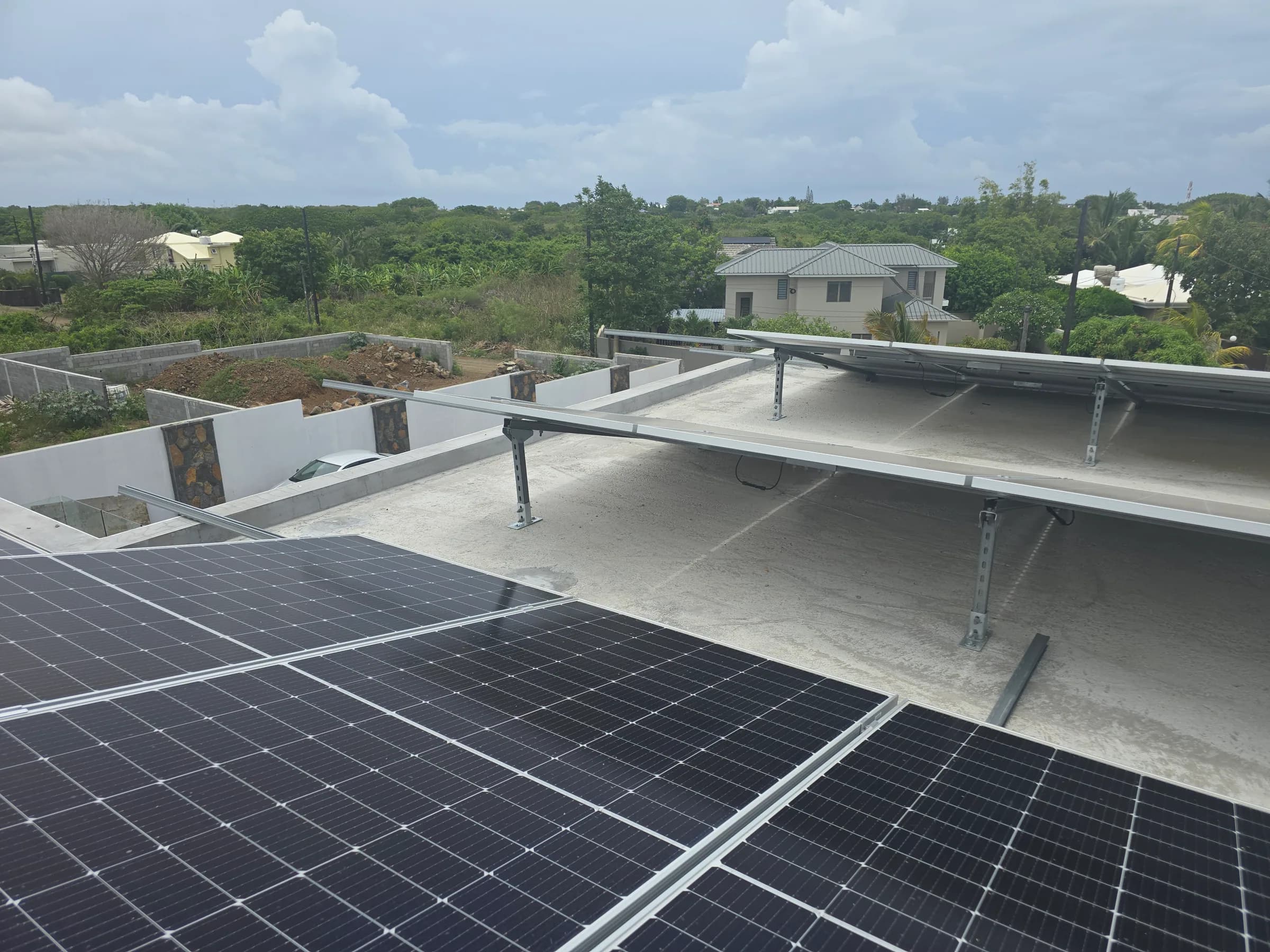 Rooftop photovoltaic array installed across a commercial building.